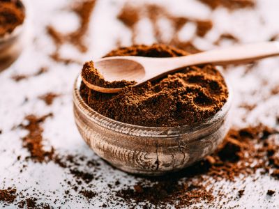 an image of a fine grind coffee beans in a glass container